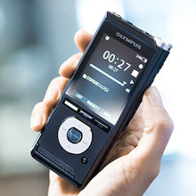 Olympus DS-2600 dictaphone being held in a right hand , to give size perspective