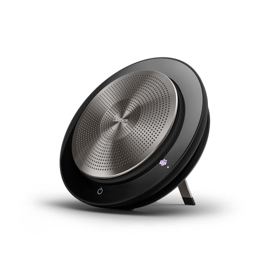 A Jabra Speak 750 speakerphone on a stand, predominantly black in color with a silver speaker grill.