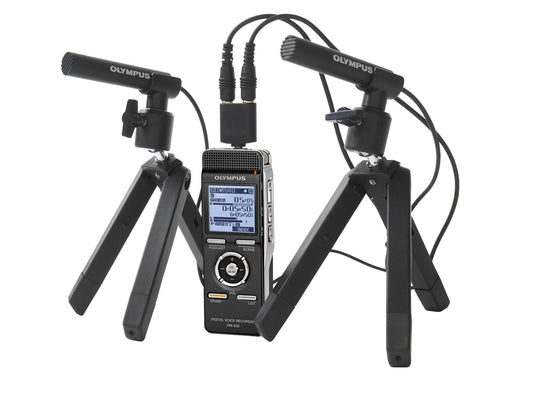 Olympus digital recorder with ME30W microphones on tripods, on white background