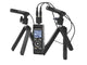 Olympus digital recorder with ME30W microphones on tripods, on white background