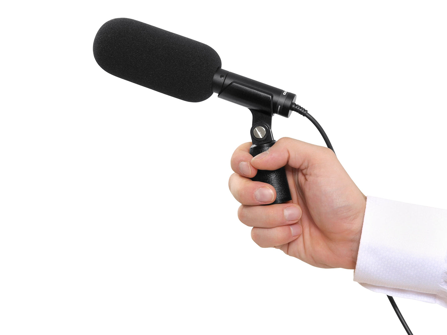 Hand holding a ME 31 microphone against a white background