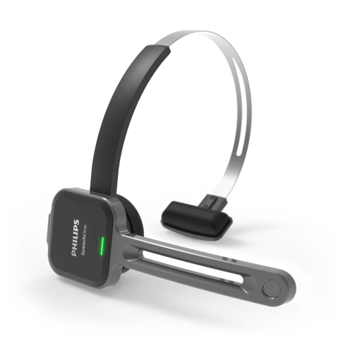 A Philips SpeechOne PSM6500 wireless dictation headset with a precision microphone and a gray and black color scheme, including an attached remote control.