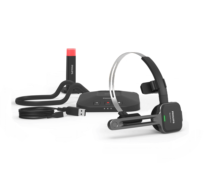 A Philips SpeechOne Wireless Dictation Headset with a precision microphone, displayed alongside a USB cable and a charging dock.