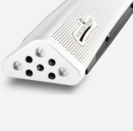 A close-up view of a white Voice Tracker II microphone with multiple holes for capturing sound.