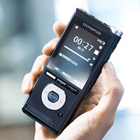 Olympus DS-2600 dictaphone being held in a right hand , to give size perspective
