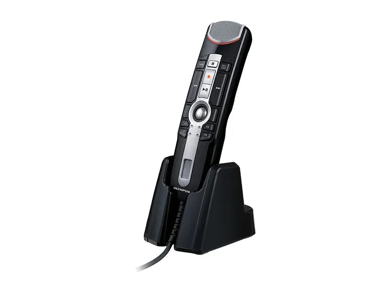 OM System RM4010P in docking station on white background