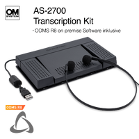 Transcription kit with pedal and headset on a white background, featuring OM System branding.