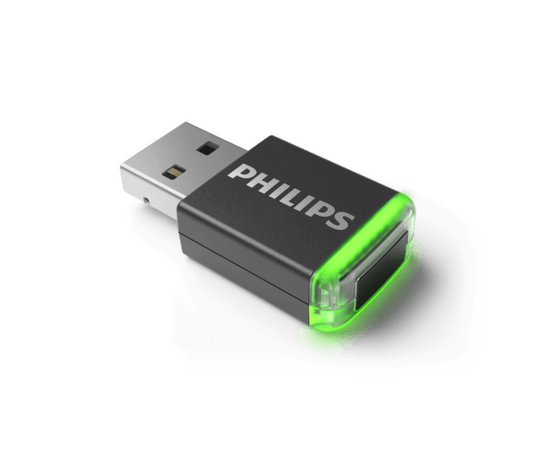 A Philips AirBridge Wireless Adapter with a USB connector and a black and green color scheme.