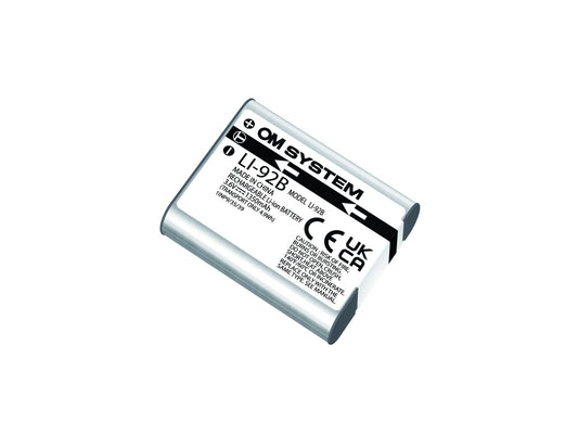 An Olympus OM System Li-92B Lithium ion Battery for DS-9500 dictaphones, showing the label with model number, voltage, capacity, and other details.