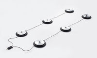 Six OM System ME33  boundary microphones set up in two lines of three to connect to voice recorder with audio splitter plug