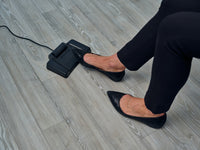 Om System RS-31N transcription foot pedal in action, with a foot on it