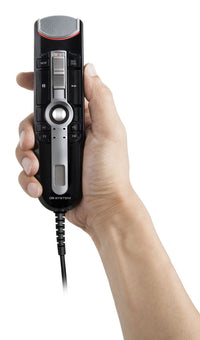 OM System RM4110N  usb tethered microphone being held by a person's right hand, to give size perspective