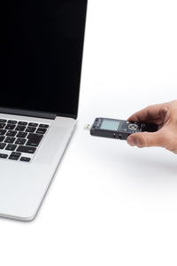 OM System WS-883 with pop out usb connector in use to connect to a laptop