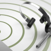 Philips PSM6300 headset dictation microphone sitting on diagram of concentric circles representing wireless range of air bridge